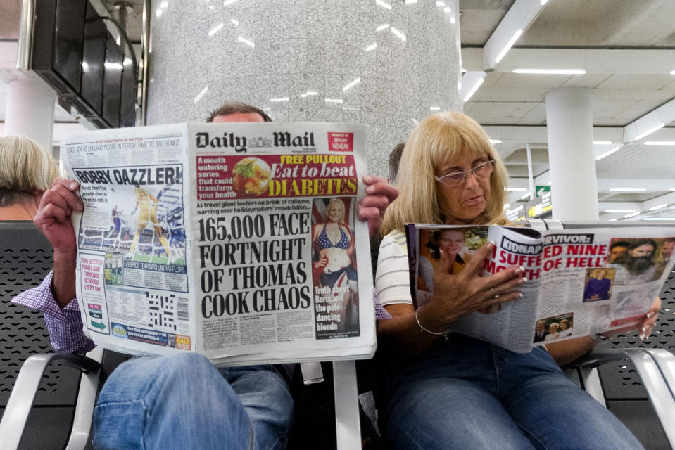 British passengers wait for news on cancelled Thomas Cook flights at Palma de Mallorca airport on Monday, Sept. 23, 2019. Spain's airport operator AENA says that 46 flights have been affected by the collapse of the British tour company Thomas Cook, mostly in the Spanish Balearic and Canary archipelagos. (AP Photo/Francisco Ubilla)