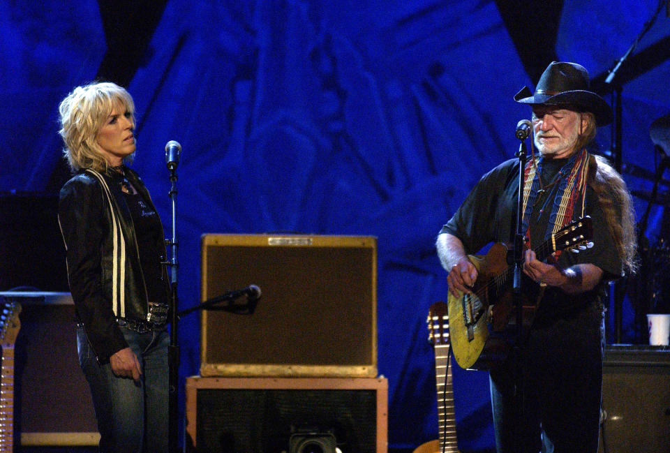 Lucinda Williams and Willie Nelson during “Willie Nelson and Friends: ‘Outlaws & Angels'” at Wiltern Theatre in Los Angeles, California - Credit: WireImage for NBC Universal Phot