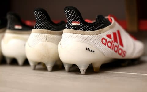 Mo Salah's boots are put out before the match - Credit: Jan Kruger - UEFA via Getty Images