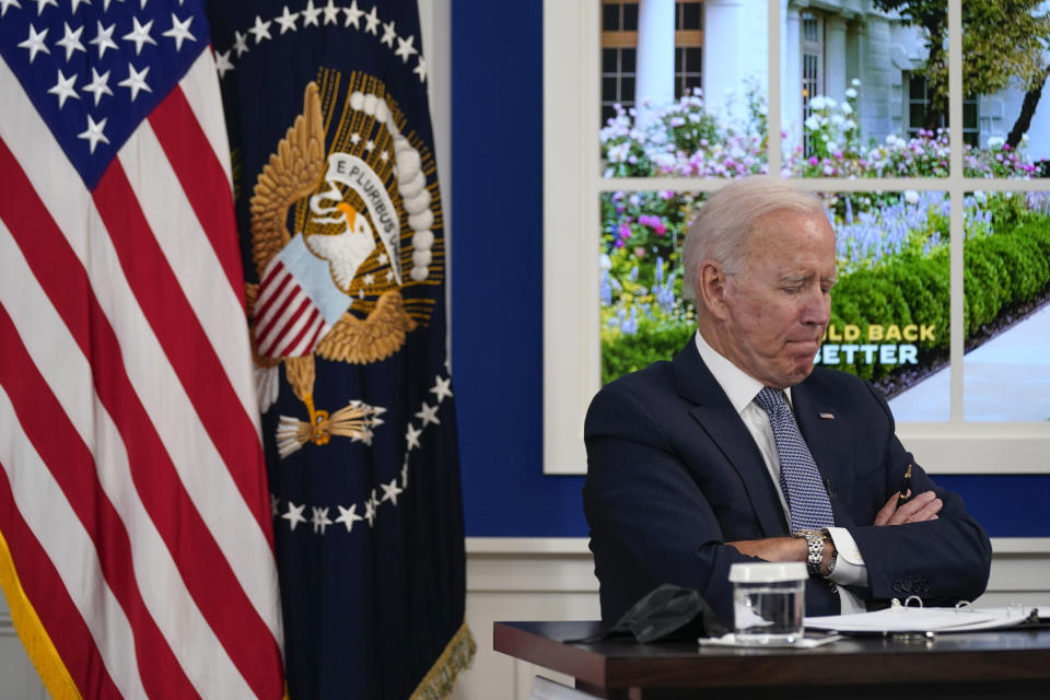 FILE - President Joe Biden listens during a meeting with business leaders about the debt limit in the South Court Auditorium on the White House campus, Oct. 6, 2021, in Washington. (AP Photo/Evan Vucci, File)