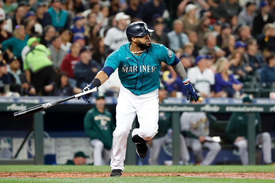 SEATTLE, WASHINGTON - SEPTEMBER 30: Carlos Santana #41 of the Seattle Mariners hits a double during the fourth inning against the Oakland Athletics at T-Mobile Park on September 30, 2022 in Seattle, Washington. (Photo by Steph Chambers/Getty Images)