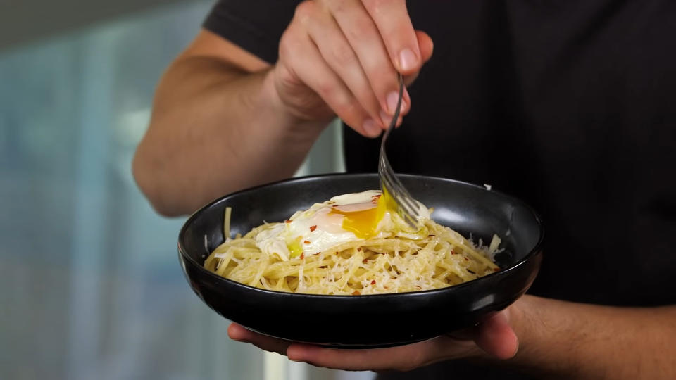 fried egg on top of pasta