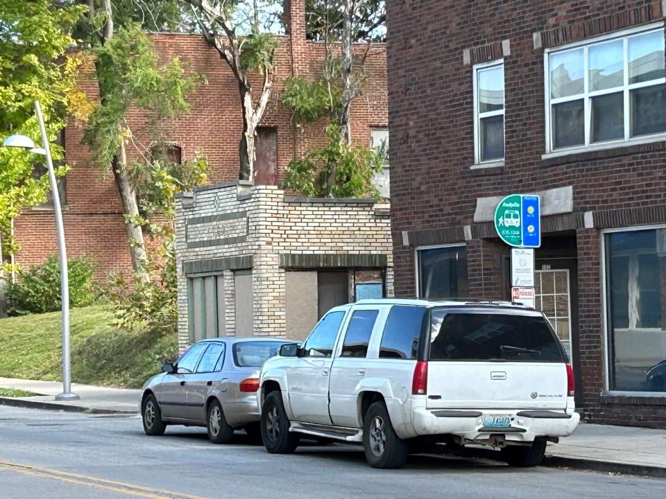 A unique micro-size building across the street from John Boner Community Centers isn't much larger than the vehicles parked near it on East 10th Street.