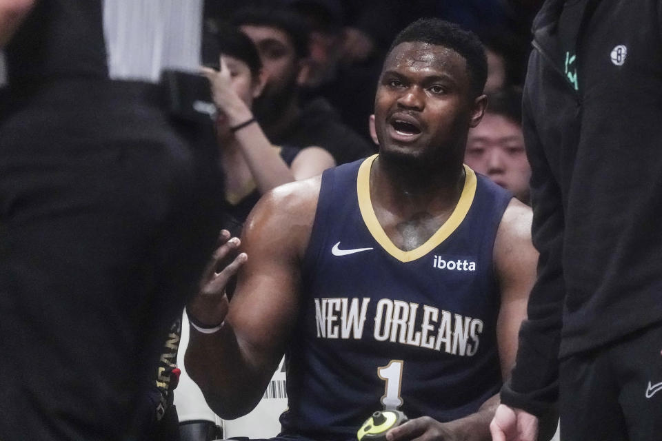 New Orleans Pelicans' Zion Williamson argues his second foul call from the bench during the first half of an NBA basketball game against the Brooklyn Nets, Tuesday, March 19, 2024, in New York. (AP Photo/Bebeto Matthews)