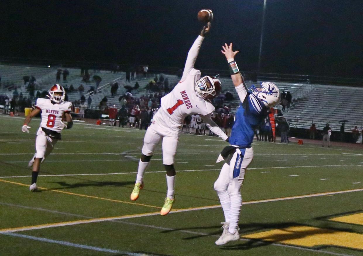 Monroe's Styhles McKenzie-Baker (1) tips the pass attempt away from Batavia wide receiver Cole Grazioplene (6) in the end zone during their Section V football Class B championship game Saturday, Nov. 12, 2022 at SUNY Brockport.