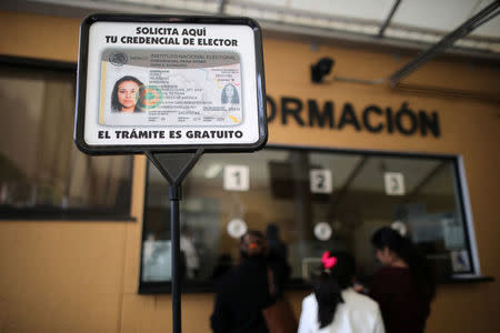 A sign encouraging Mexicans to register to vote is seen in the Mexican Consulate in Los Angeles, California U.S. January 16, 2018. REUTERS/Lucy Nicholson