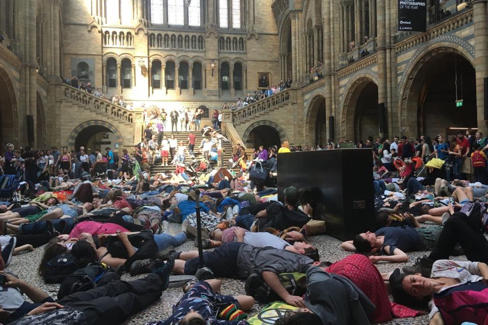 Extinction Rebellion protesters lying down inside the Natural History Museum (Mason Boycott-Owen/PA)