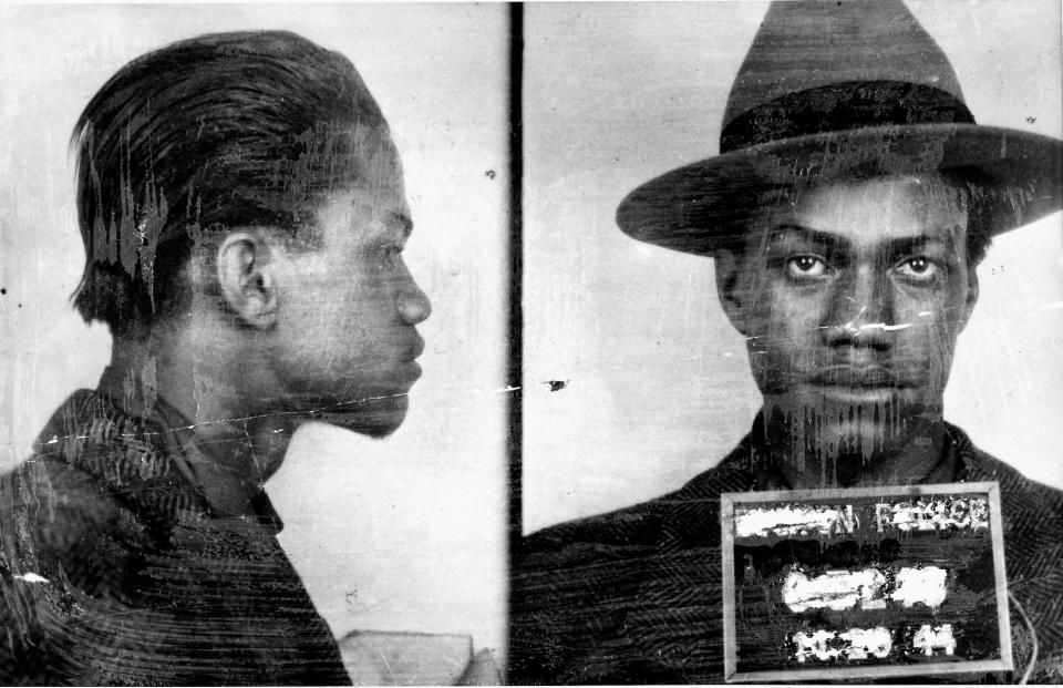 Police mug shot of Malcolm X.