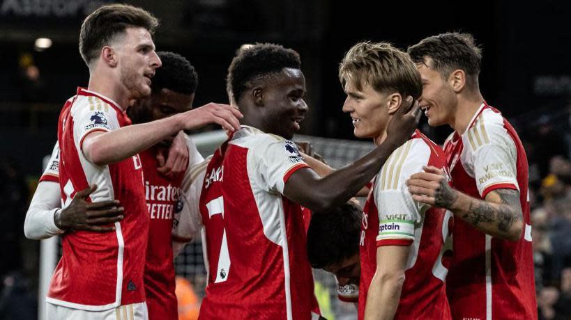 Arsenal players celebrate a goal against Wolves on Saturday