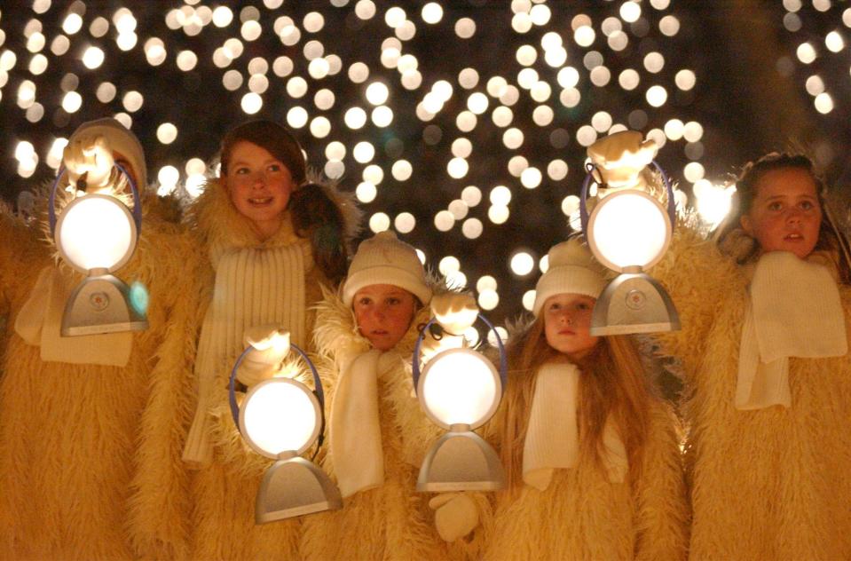 Children with lanterns are pictured during the Salt Lake 2002 Winter Games opening ceremony at the University of Utah’s Rice-Eccles Stadium in Salt Lake City on Friday, Feb 8, 2002. | Laura Seitz, Deseret News