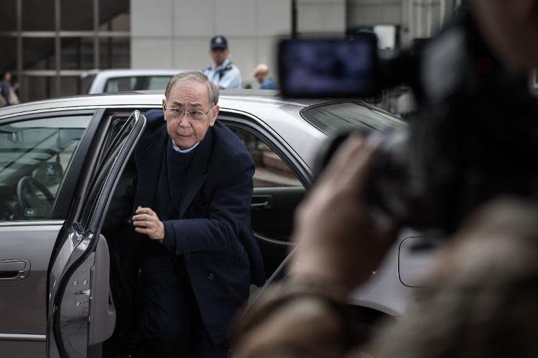 Hong Kong's former chief secretary Rafael Hui arrives at the High Court during his corruption trial, on May 8, 2014