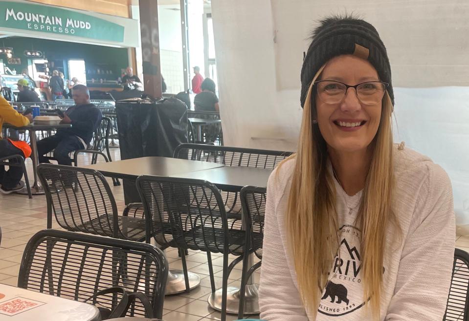 Kym Hop of Rapid City took a pizza break during a recent shopping trip to the Uptown Rapid mall in Rapid City. Hop, who likes to support local stores, said she is excited to return to in-person shopping and browsing now that the COVID-19 pandemic has eased.