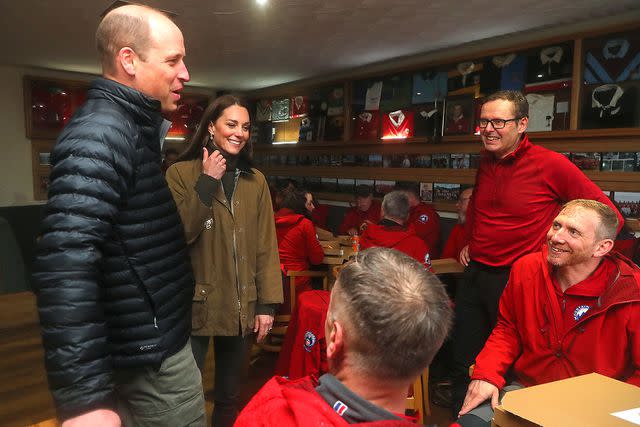 Geoff Caddick - WPA Pool/Getty Images Prince William and Kate Middleton with the Mountain Rescue team