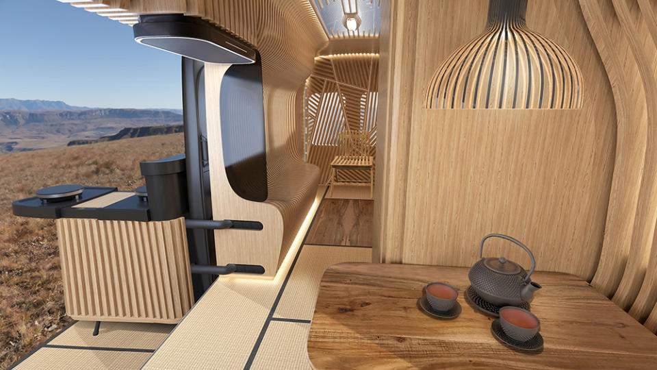 The Alpine Cross Cabin camper van concept front work and dining area