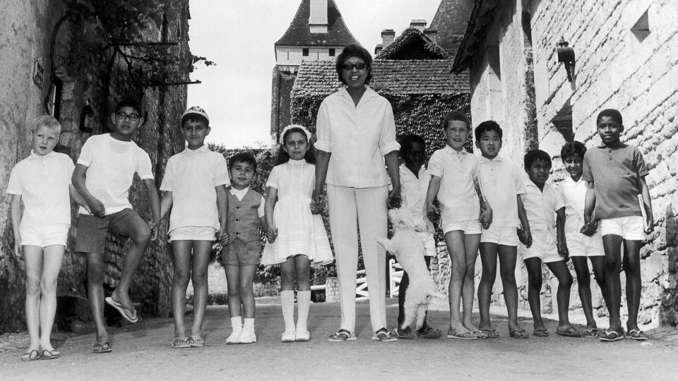 Josephine Baker poses with her adopted children, all of different national origins, at her                  Château des Milandes.  / Credit: Keystone-France/Gamma-Keystone via Getty Images
