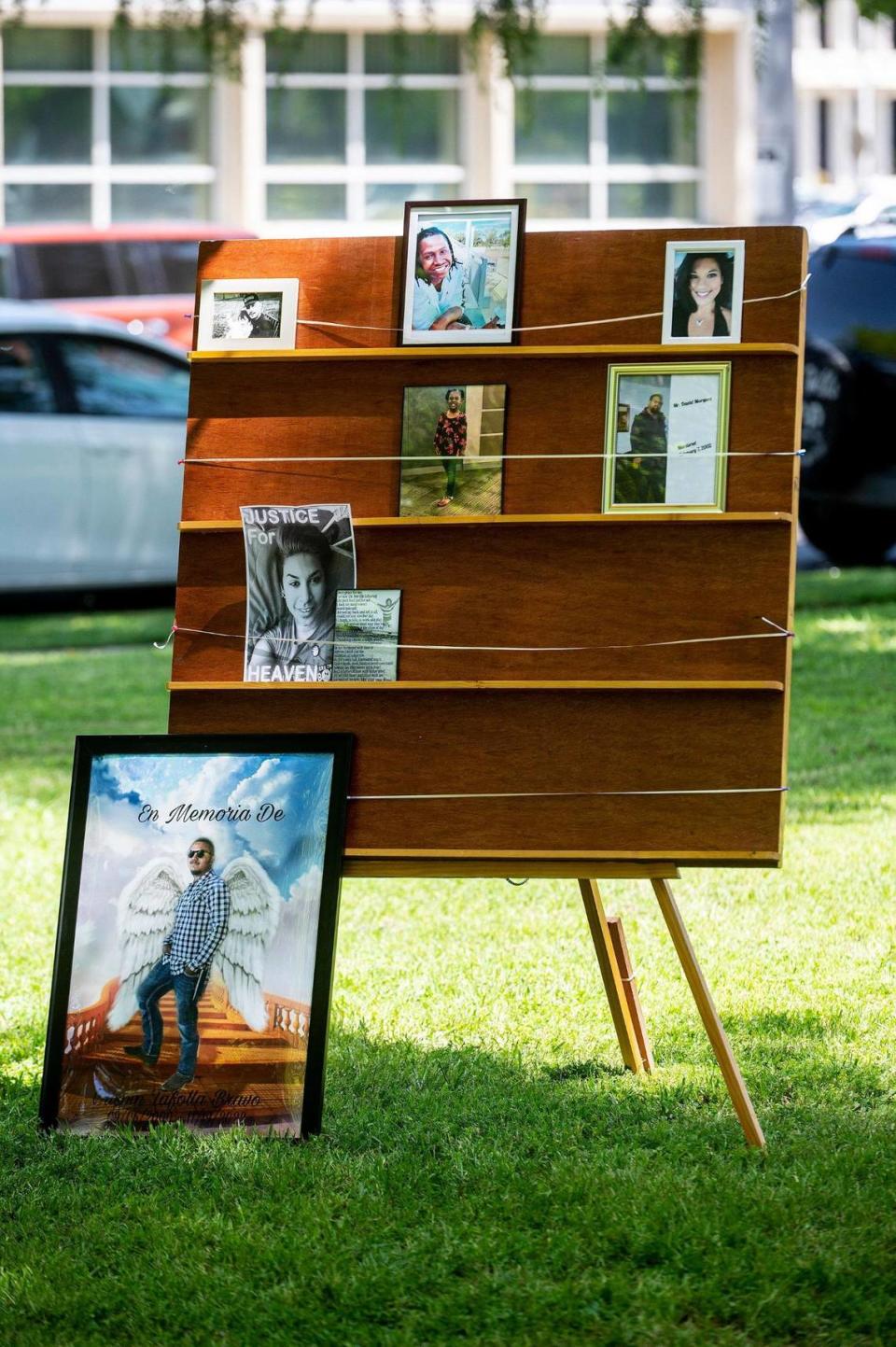 Photos of victims of violence and crime are displayed during the Merced County Victims’ Rights Ceremony at Courthouse Park in Merced, Calif., on Tuesday, April 25, 2023. The annual event held to remember victims of violence and crime, is hosted by the Merced County District Attorney’s Office during National Crime Victims’ Rights Week.