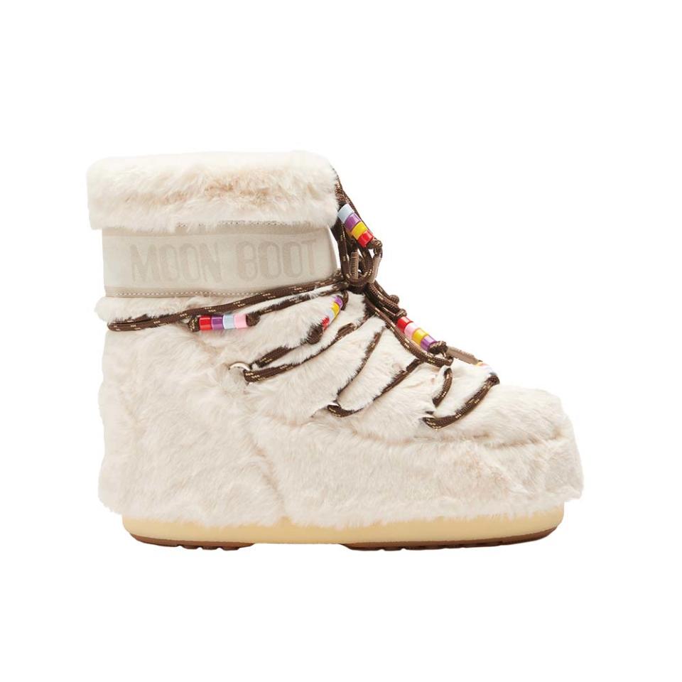 Rihanna, who visited Aspen over the holidays, paired her Giorgio Armani faux fur coat and sweatsuit with these Icon Low cream faux fur Moon Boots sporting bead-embellished laces inspired by the 1969 lunar landing; $470, moonboot.com
