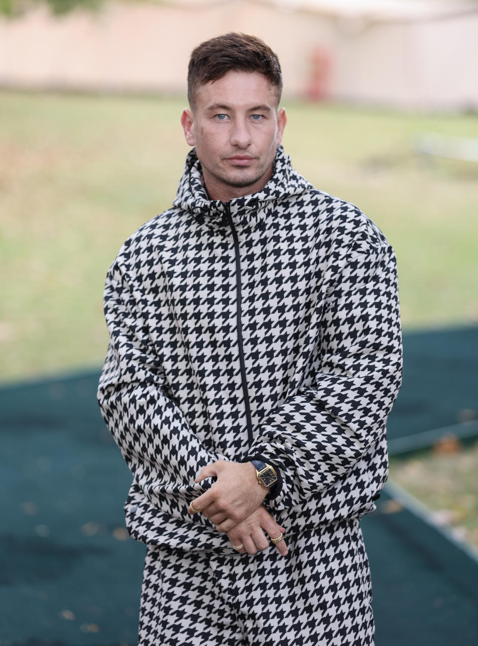 Close-up of Barry in a checkered suit