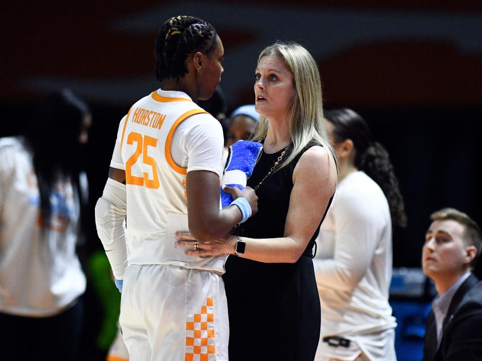 Tennessee basketball coach Kellie Harper talks with Jordan Horston (25) during the game college basketball game against Toledo in the second round of the NCAA college basketball tournament on Monday, March 20, 2023 in Knoxville, Tenn.  