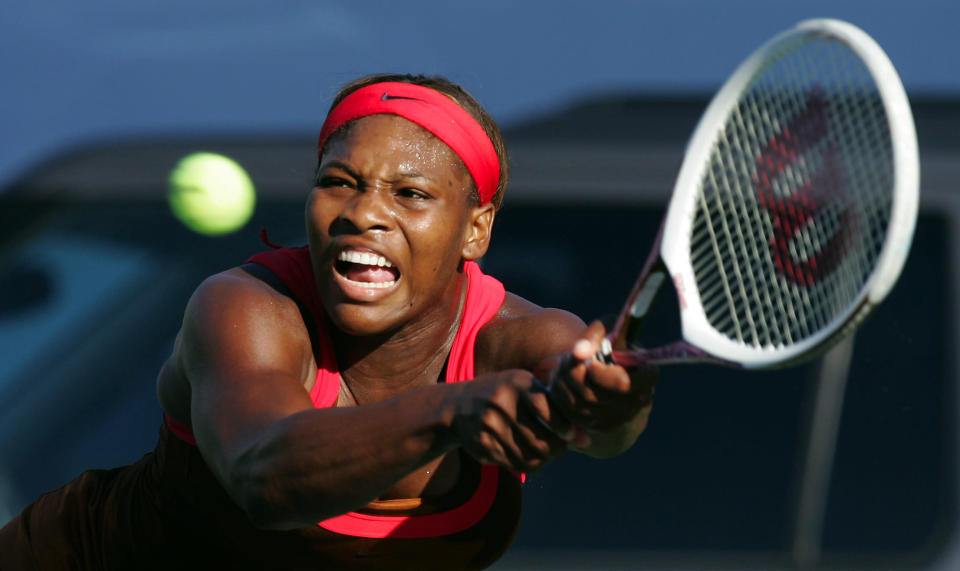 Serena Williams returns a shot to Ashley Harkleroad during their match at the JPMorgan Chase Open tennis tournament Wednesday, Aug. 9, 2006, in Carson, Calif. Williams won the match 6-3, 6-2. (AP Photo/Mark J. Terrill)