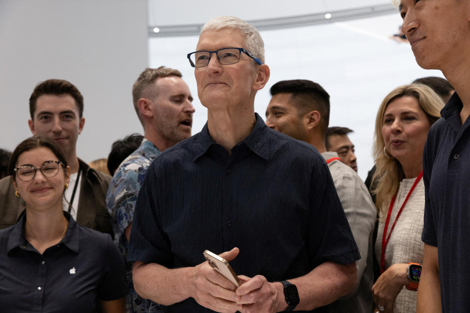 CEO of Apple Tim Cook poses as Apple holds an event at the Steve Jobs Theater on its campus in Cupertino, California, U.S. September 9, 2024. REUTERS/Manuel Orbegozo