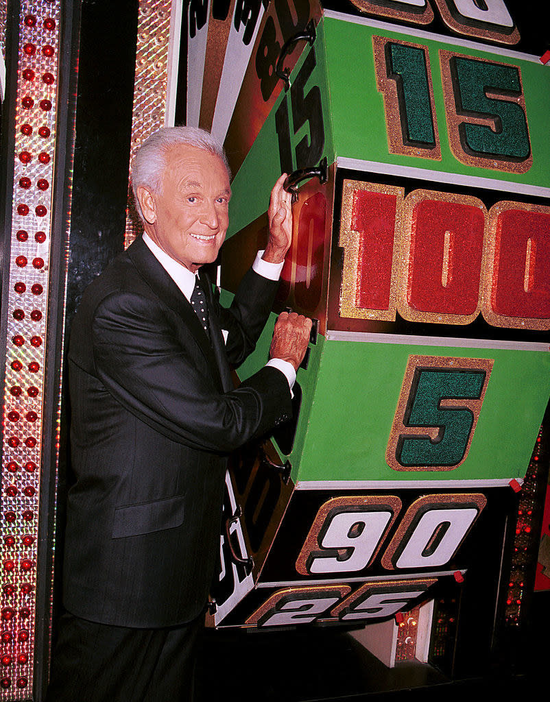 game show host Bob Barker poses by one of the game props at CBS Studios to celebrate his 30th anniversary as host of "The Price Is Right"