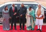 Indian President Ramnath Kovind (C) extends his hand for a handshake with his Maldives counterpart Ibrahim Mohamed Solih (2nd L) as Solih’s wife Fazna Ahmed (L), Kovind’s wife Savita Kovind and India's Prime Minister Narendra Modi (R) look on, during Solih’s ceremonial reception in New Delhi, December 17, 2018. REUTERS/Adnan Abidi