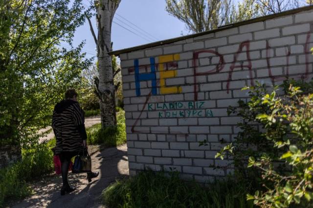 A graffiti with the letter Z is seen at the garden wall of 74-year-old Valentyna Haras in Kherson