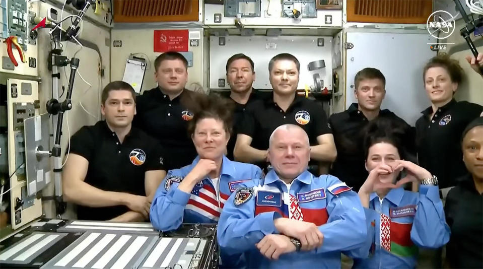 The combined 10-member station crew gathered for a brief video call with the Russian mission control center near Moscow. Back row (left to right): Nikolai Chub, Alexander Grebenkin, Mike Barratt, Oleg Kononenko, Matthew Dominick, Loral O'Hara. Front row (left to right): Tracy Dyson, Oleg Novitskiy, Marina Vasilevskaya, Jeanette Epps. / Credit: NASA TV