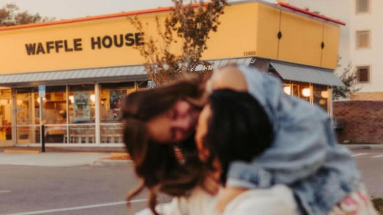 Couple in front of Waffle House