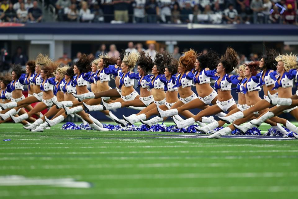 <p>The Dallas Cowboys cheerleaders perform on the field prior to the game against the Washington Redskins at AT&T Stadium on November 24, 2016 in Arlington, Texas. (Photo by Tom Pennington/Getty Images) </p>