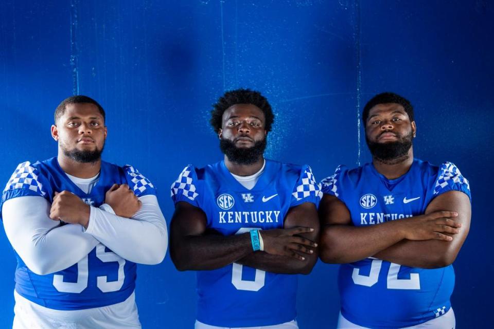 Kentucky defensive linemen Josaih Hayes, left, Octavious Oxendine, middle, and Justin Rogers, right, are key components of the Wildcats’ defensive line in 2022. “The goal is to get to Atlanta (for the SEC championship game),” Hayes said.