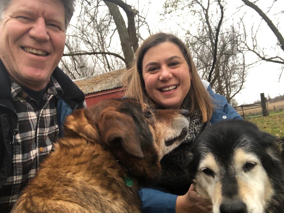 Dave Moore, a retired U.S. Army colonel and former Apache pilot, and his wife Elissa Slotkin, a Democrat who won Congressional District 8. The couple played with their dogs Dakota and Dixie on the Slotkin family farm in Holly, Mich., the day after the Nov. 6, 2018 election.