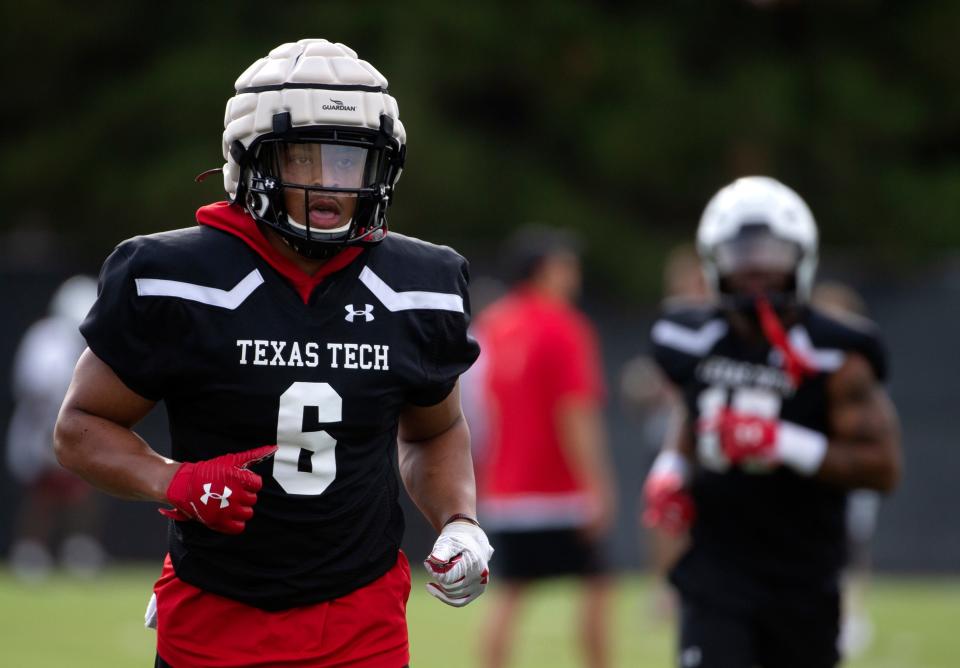 Texas Tech linebacker Kosi Eldridge (6) goes through the Red Raiders' first day of preseason practice on Friday. The senior from Denton Ryan suffered a concussion that disrupted his 2021 season and his life off the field.