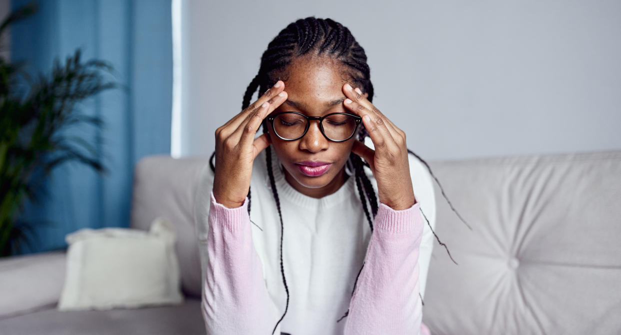 stressed woman with high cortisol levels