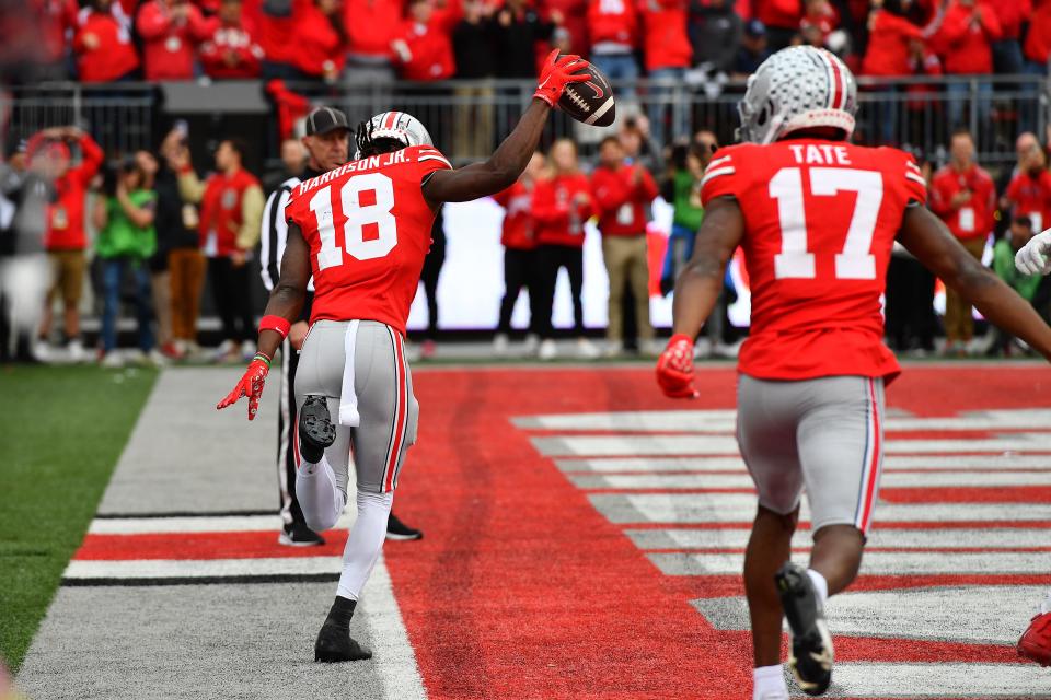 Marvin Harrison Jr. #18 of the Ohio State Buckeyes celebrates after scoring a touchdown during the fourth quarter of a game against the Penn State Nittany Lions at Ohio Stadium on Oct. 21, 2023, in Columbus, Ohio.