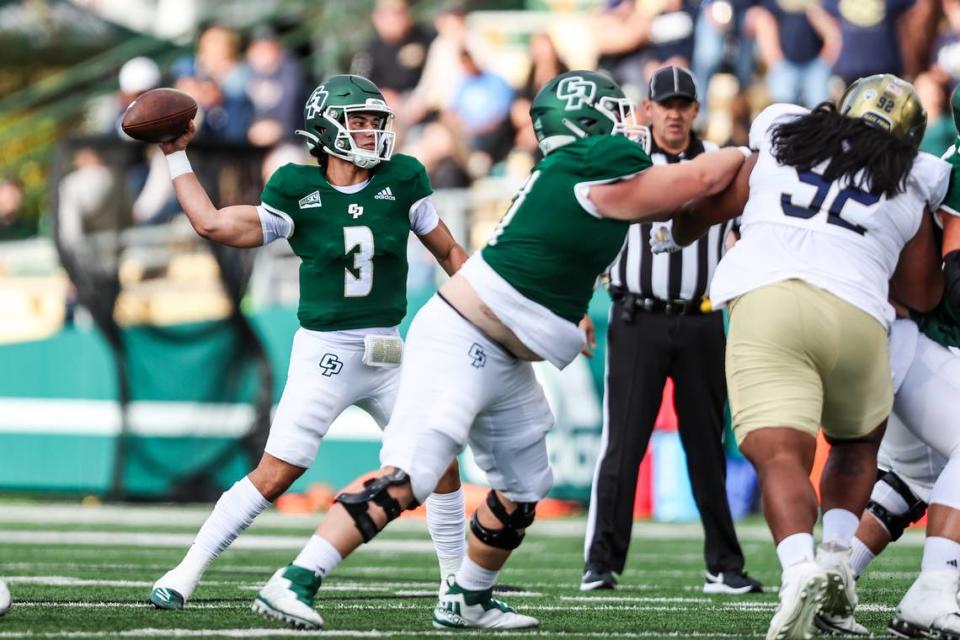 Cal Poly quarterback Bo Kelly (3) throws a pass in the first half of the Mustangs’ 31-13 loss to UC Davis on Sept. 30, 2023, at Spanos Stadium.