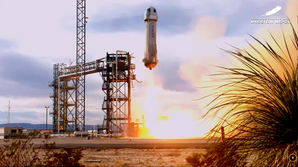 Blue Origin's New Shepard sub-orbital spacecraft blasts off from Jeff Bezos' West Texas ranch and flight facility carrying more than 30 experiments on an up-and-down trip to the edge of space. It was the company's first launch since a booster failure during an unpiloted flight last year. / Credit: Blue Origin webcast