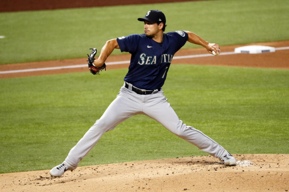 Seattle Mariners starting pitcher Marco Gonzales delivers to the Texas Rangers in the first inning of a baseball game in Arlington, Texas, Tuesday, Aug. 11, 2020. (AP Photo/Ray Carlin)