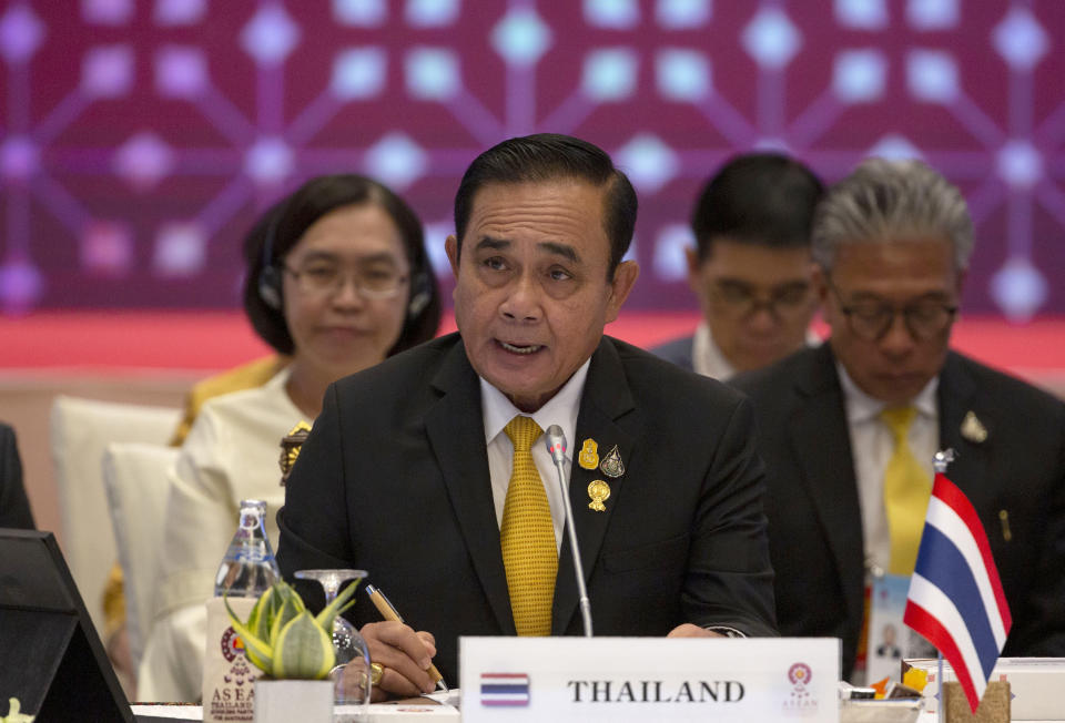 Thailand's Prime Minister Prayuth Chan-ocha speaks during the Association of Southeast Asian Nations (ASEAN) leaders summit plenary session in Bangkok, Thailand, Saturday, June 22, 2019. (AP Photo/Gemunu Amarasinghe)