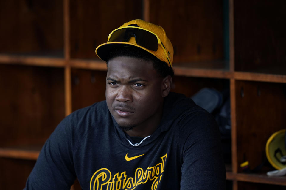 Pittsburgh Pirates second baseman Termarr Johnson sits in the dugout before a spring training baseball game against the Detroit Tigers Saturday, March 9, 2024, in Lakeland, Fla. (AP Photo/Charlie Neibergall)