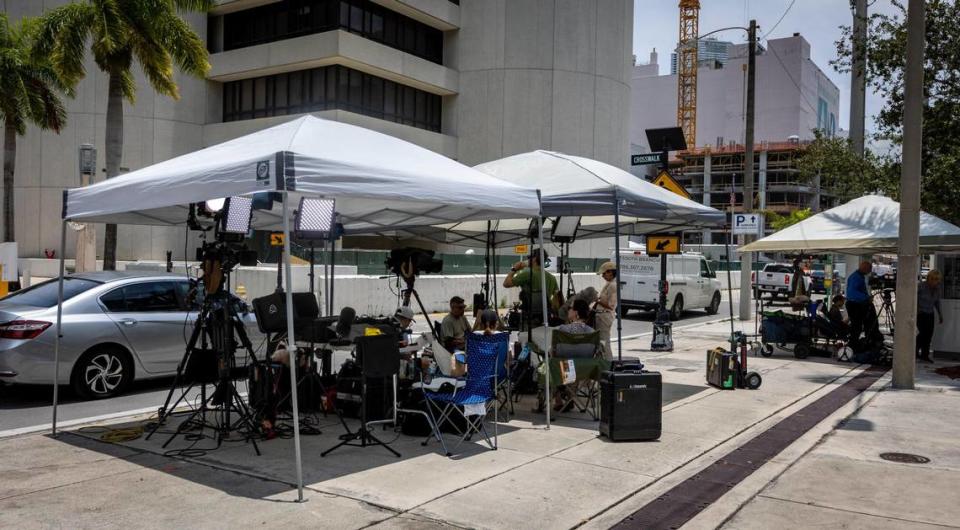 Tents outside the Federal Courthouse in Miami shield a growing number of news reporters monitoring events as a grand jury gathers evidence related to the possible mishandling of classified documents by former President Donald J. Trump.