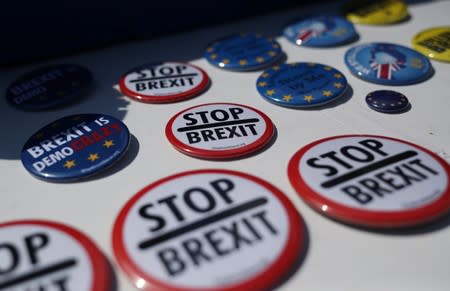 Anti-Brexit badges are seen on display in London