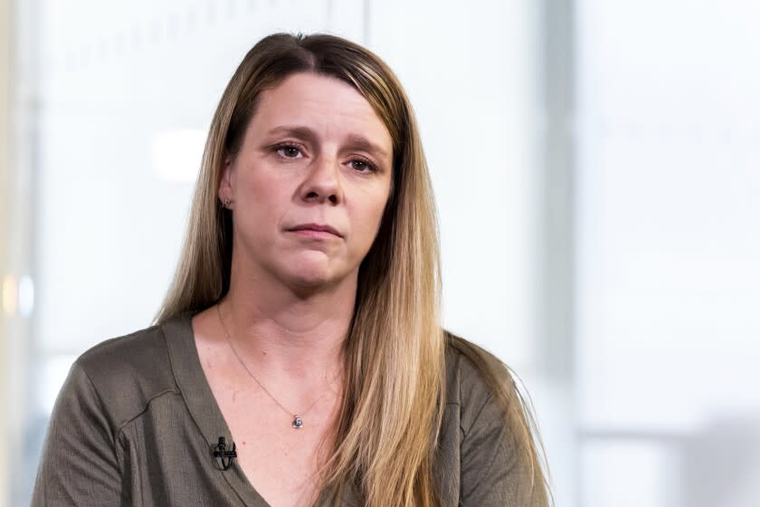 Gabby Petito's mother Nichole Schmidt speaks during an interview with The Associated Press, Monday, Aug. 1, 2022, in New York. The Gabby Petito Foundation is donating $100,000 to the Hotline. (AP Photo/Julia Nikhinson)