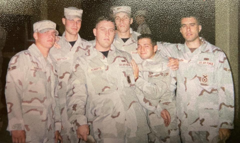 Air Force veteran Casey Kenrick of Rapid City, at far left, poses for a snapshot with other service members while serving in Saudi Arabia.