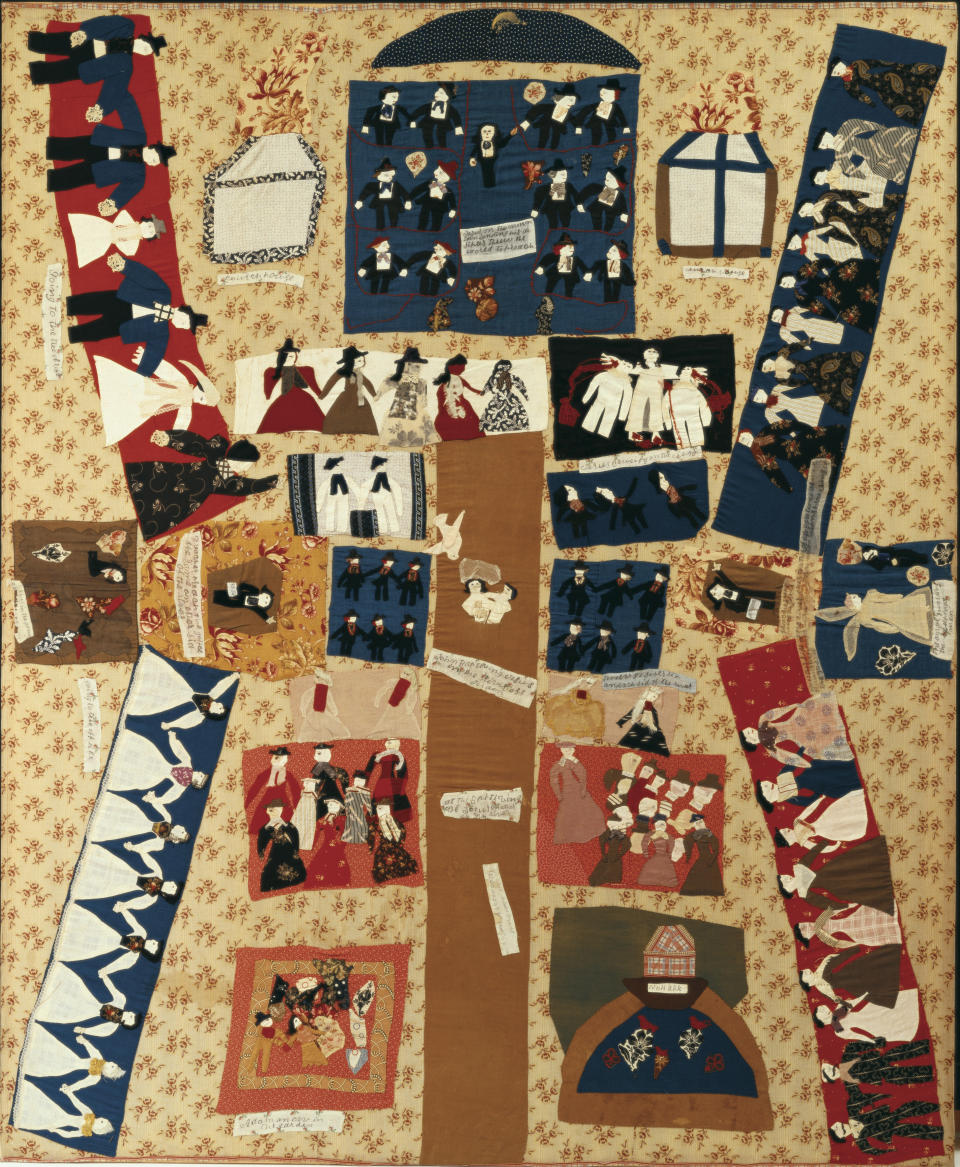 This image provided by the American Folk Art Museum shows the Sacret Bibel Quilt Top, which was made between 1875 and 1895. The "Sacret Bibel" is known by the maker's phonetically spelled inscription at the top. The name Susan Arrowood is inscribed at the bottom, but nobody knows who Susan might have been, despite extensive research in the area where the quilt was found. It's a busy, color- and imagery-packed, appliqued picture book of vignettes drawn from Bible stories, and perhaps from people and experiences in the quilter's own life. (American Folk Art Museum via AP)