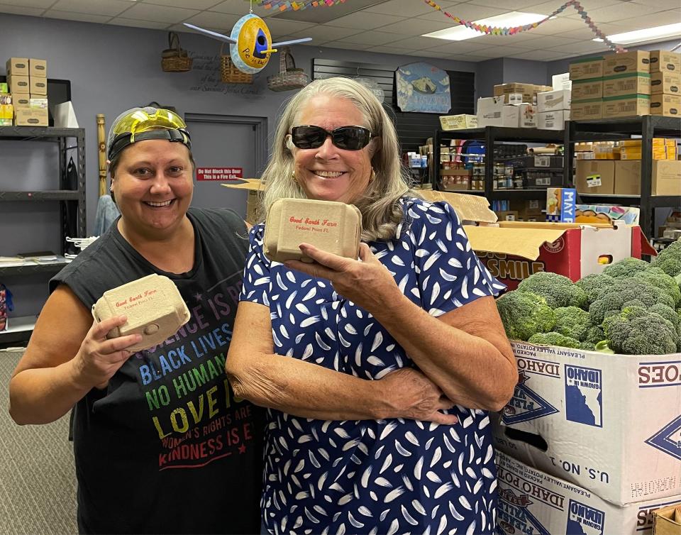 Betsy, left, and Linda Freeman of Good Earth Farm display some of the eggs they have donated to Pie in the Sky Community Alliance, a nonprofit that delivers food to needy seniors.