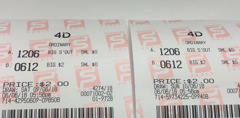 A $1.25 million lottery win in 2002 was equally attributable to a married couple, instead of solely from one spouse, the Court of Appeal ruled on Thursday (2 May). (Yahoo News Singapore file photo of a 4D ticket)