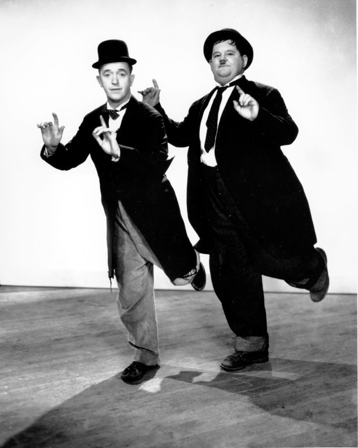 This is a 1936 photo of comedic actors Stan Laurel, left, and Oliver Hardy.