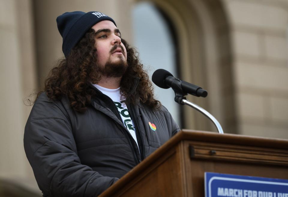 Michigan State University student Troy Forbush, an Okemos High School graduate, speaks on March 23, 2023, during the March for Our Lives rally at the state Capitol. Forbush spoke publicly for the first time about his brush with death after being shot in the chest on February 13, 2023, when a lone gunman shot and killed three students, and critically injured five. The event was organized by the MSU March for Our Lives chapter. His attorney has filed a notice of intent to sue MSU.